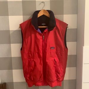 Patagonia red vest with navy fleece inside. Size small.